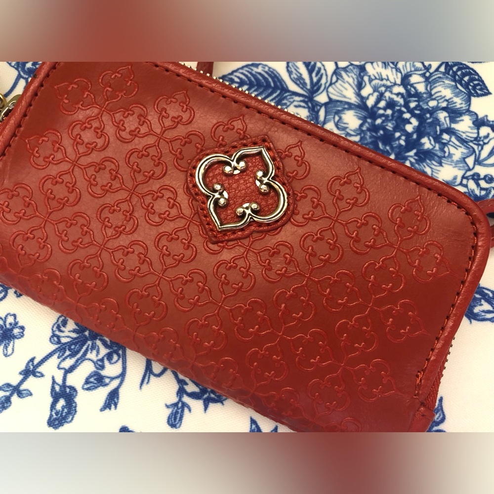 Brighton Wallet with a wrist strap and a shoulder strap